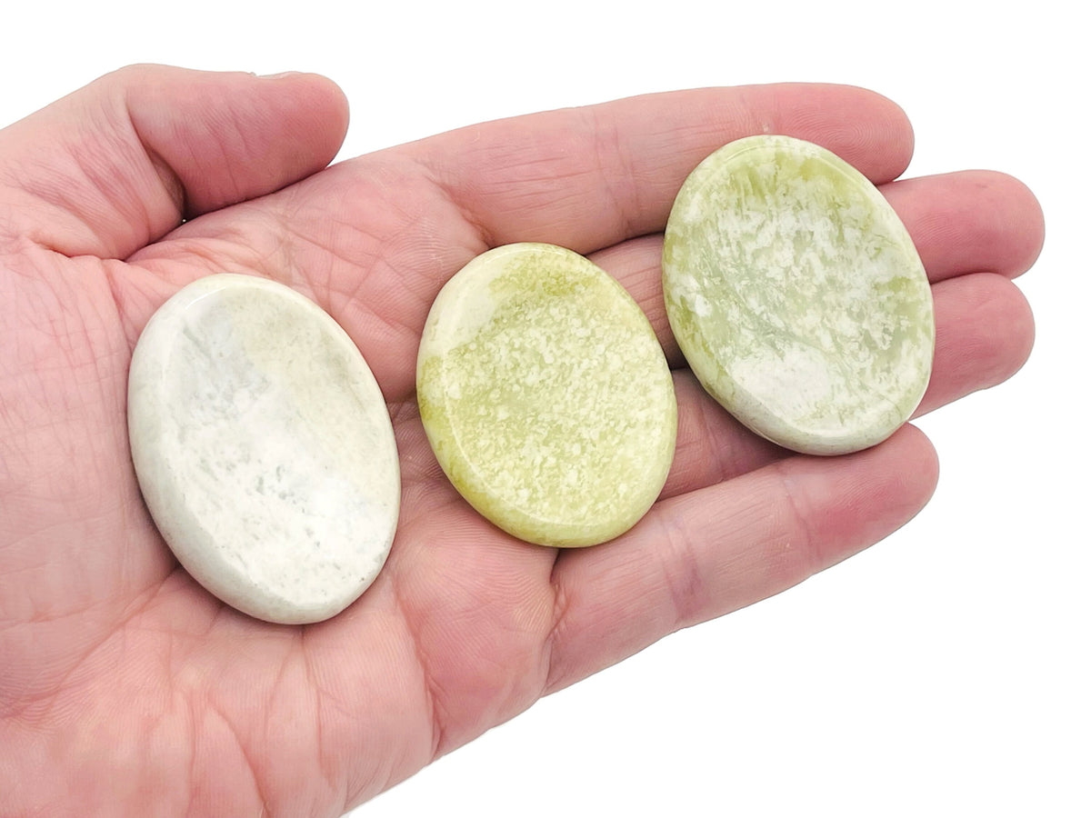 Smooth jade worry stone from GemstoneGO, 4.5x3.5cm, with a polished surface ideal for calming and stress relief.