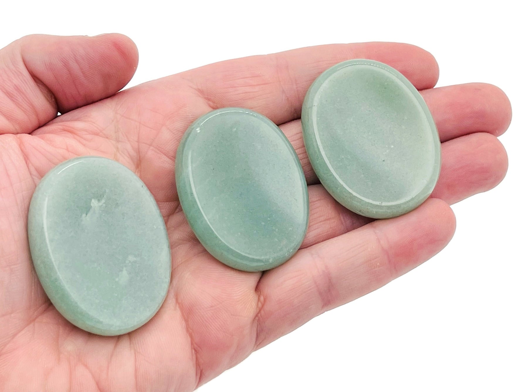 Aventurine worry stone from GemstoneGO, 4.5x3.5cm, featuring smooth polished green crystal for stress relief and soothing tactile experience.