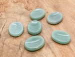Aventurine worry stone from GemstoneGO, smooth 4.5x3.5cm calming crystal for stress relief and meditation.