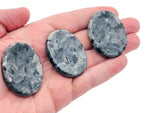 Larvikite worry stone from GemstoneGO, smooth 4.5x3.5cm crystal for soothing meditation and stress relief.