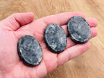 Larvikite worry stone from GemstoneGO, smooth 4.5x3.5cm crystal for soothing touch and meditation.