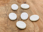 White Jade worry stone from GemstoneGO, smooth soothing crystal with 4.5x3.5cm size, showcasing polished white jade surface.