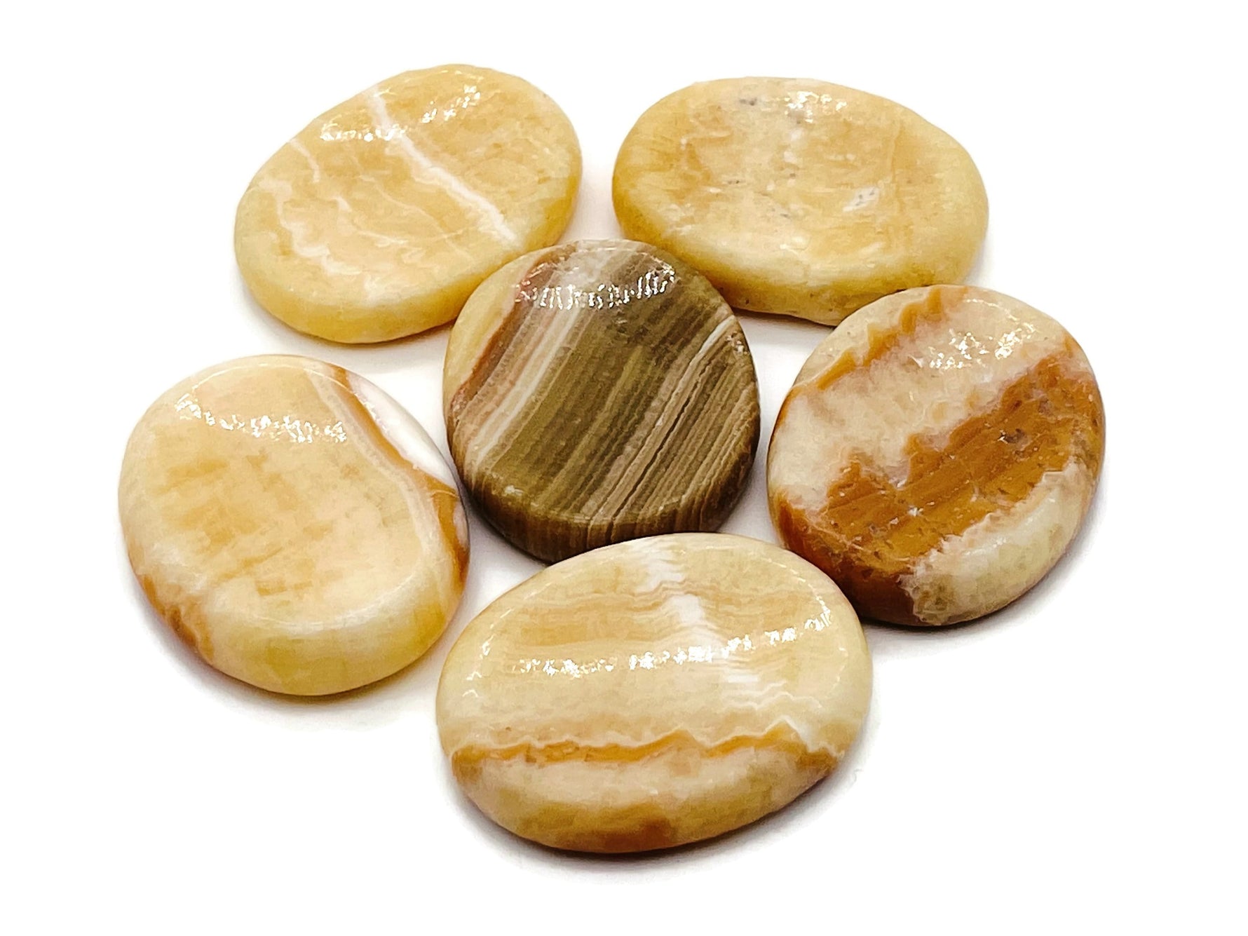Yellow calcite worry stone from GemstoneGO, 4.5x3.5cm soothing crystal with polished smooth surface for stress relief.