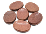 Goldstone worry stone from GemstoneGO, 4.5x3.5cm soothing crystal for stress relief and tactile comfort.