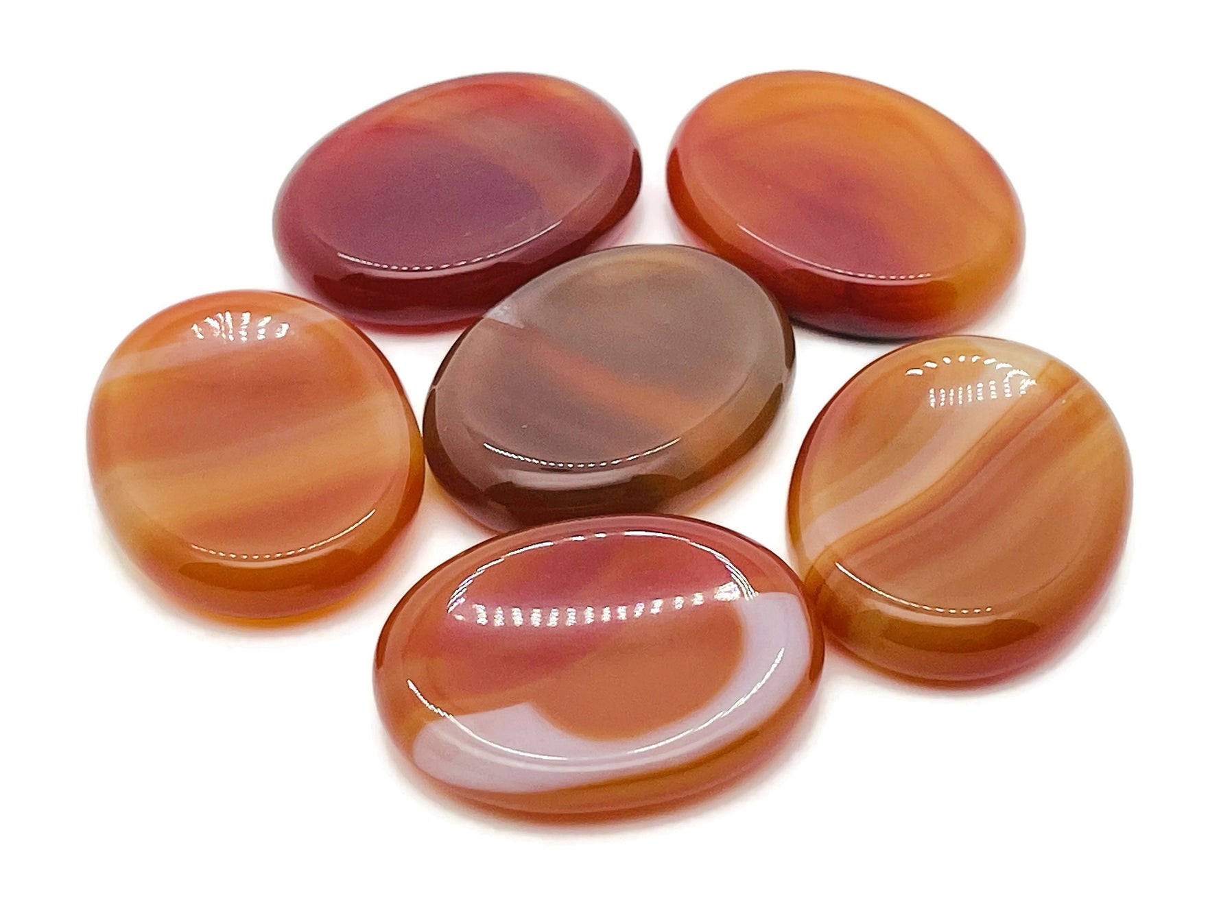 Carnelian worry stone from GemstoneGO, 4.5x3.5cm, smooth soothing crystal for stress relief and meditation.