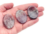 Strawberry Quartz worry stone from GemstoneGO, 4.5x3.5cm, featuring smooth, polished surface for soothing crystal therapy.