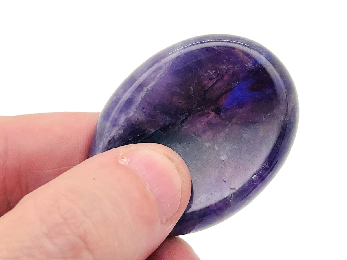 Amethyst worry stone from GemstoneGO, 4.5x3.5cm, featuring smooth polished purple crystal for calming and stress relief.