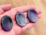 Amethyst worry stone from GemstoneGO, 4.5x3.5cm soothing crystal for stress relief and meditation, smooth polished surface.