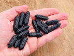 Lava volcanic terminated carved point gemstone, 33mm, with natural textures and deep black color, from GemstoneGO.