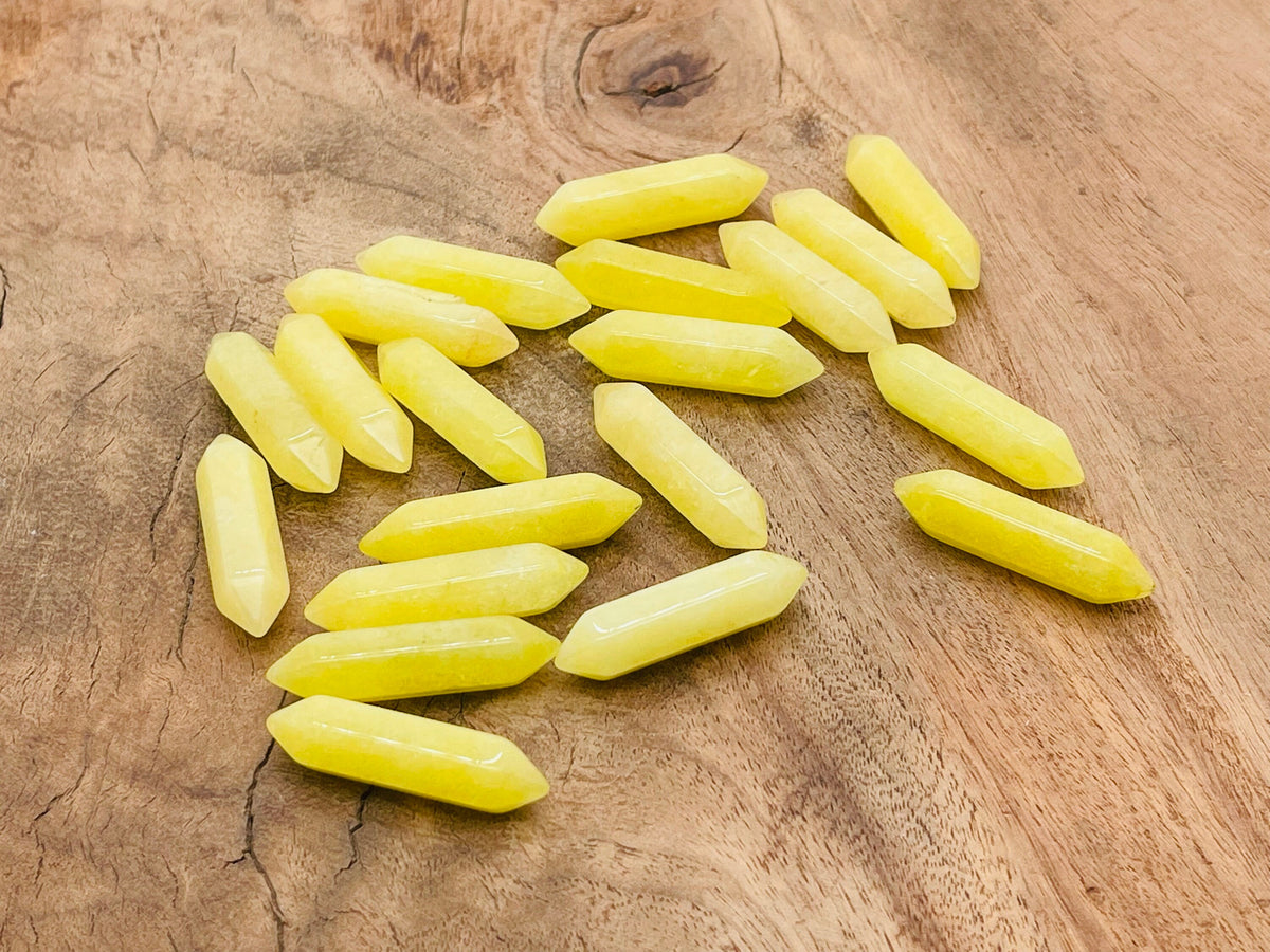 Lemon Jade terminated carved point gemstone from GemstoneGO, 33mm length with detailed natural carving.