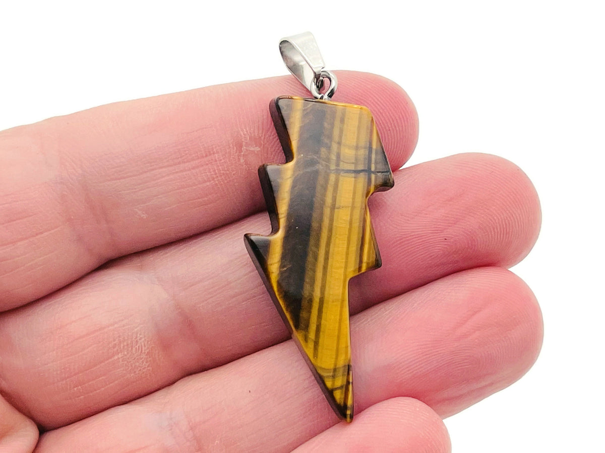 Tiger Eye Lightning Crystal Pendant featuring a striking lightning stone design, crafted by GemstoneGO.