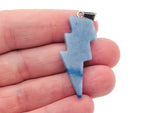 Blue aventurine lightning crystal pendant with a vibrant blue gemstone and lightning-inspired design, crafted by GemstoneGO.