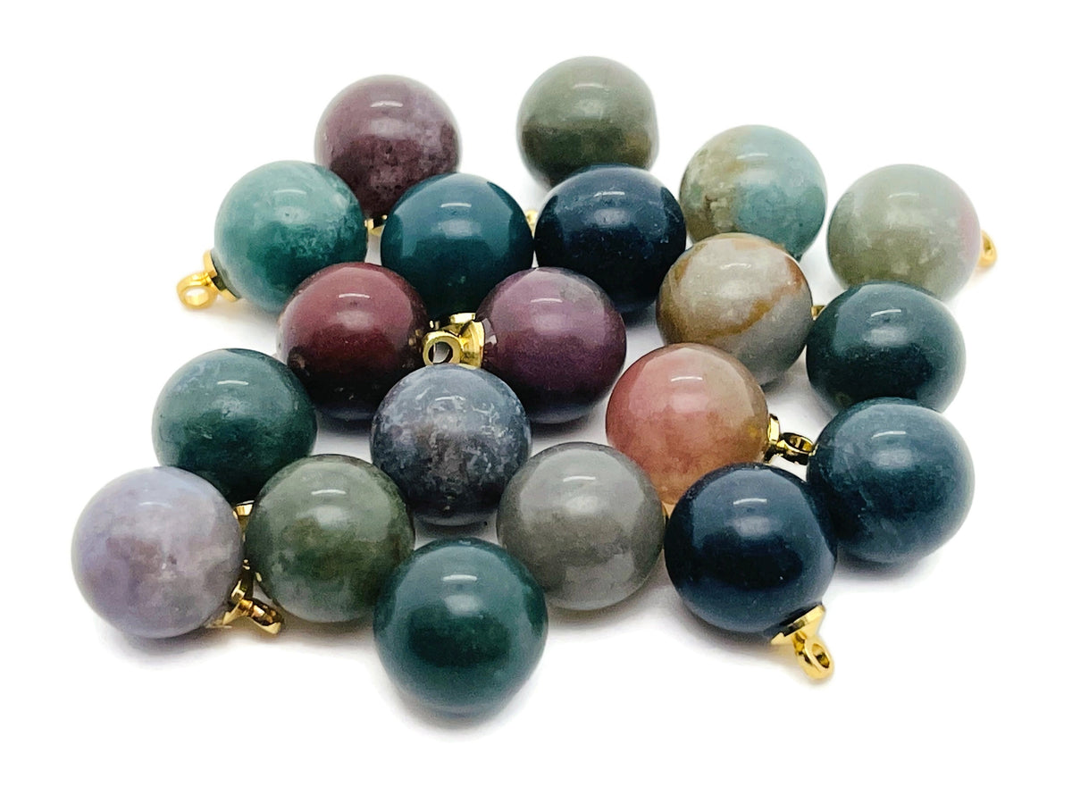 Moss agate ball beads crystal pendant from GemstoneGO, showcasing polished gemstone jewelry stone with natural green and brown patterns.