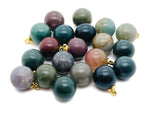 Moss agate ball beads crystal pendant from GemstoneGO, showcasing polished gemstone jewelry stone with natural green and brown patterns.