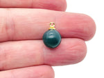 Moss agate ball beads with crystal pendant, showcasing natural stone jewelry from GemstoneGO.