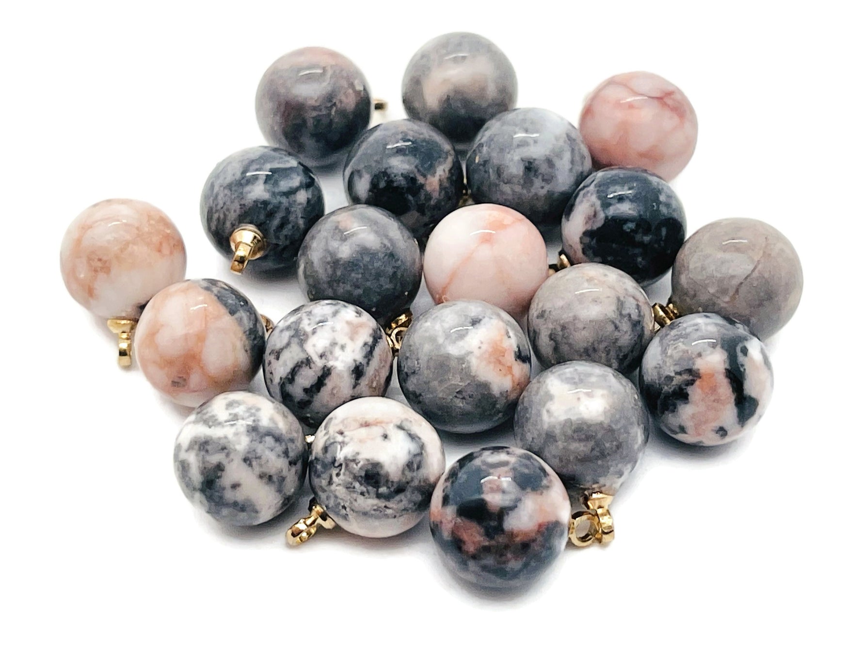 Pink Zebra Calcite ball beads crystal pendant featuring vibrant pink and white hues, handcrafted jewelry stone from GemstoneGO.
