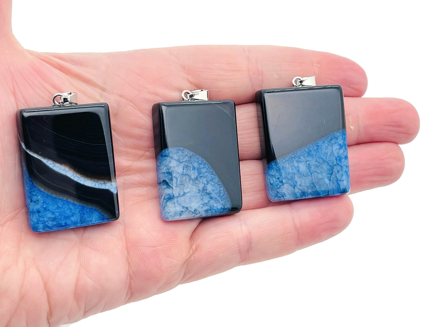 Blue and black agate crystal pendant with charm, featuring a polished stone on a silver chain, ideal as a gift for her.