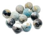 Caribbean Calcite gemstone sphere, 30mm crystal ball from GemstoneGO, polished stone with vibrant orange and yellow hues.