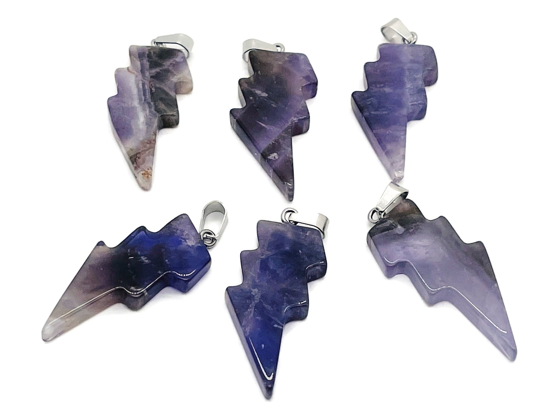 Amethyst lightning crystal pendant from GemstoneGO featuring a striking lightning stone design on a silver chain.