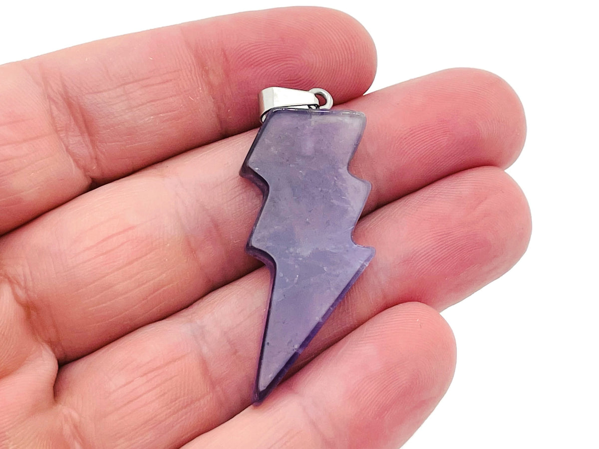 Amethyst lightning crystal pendant with lightning stone design from GemstoneGO, showcasing a polished purple gemstone pendant.