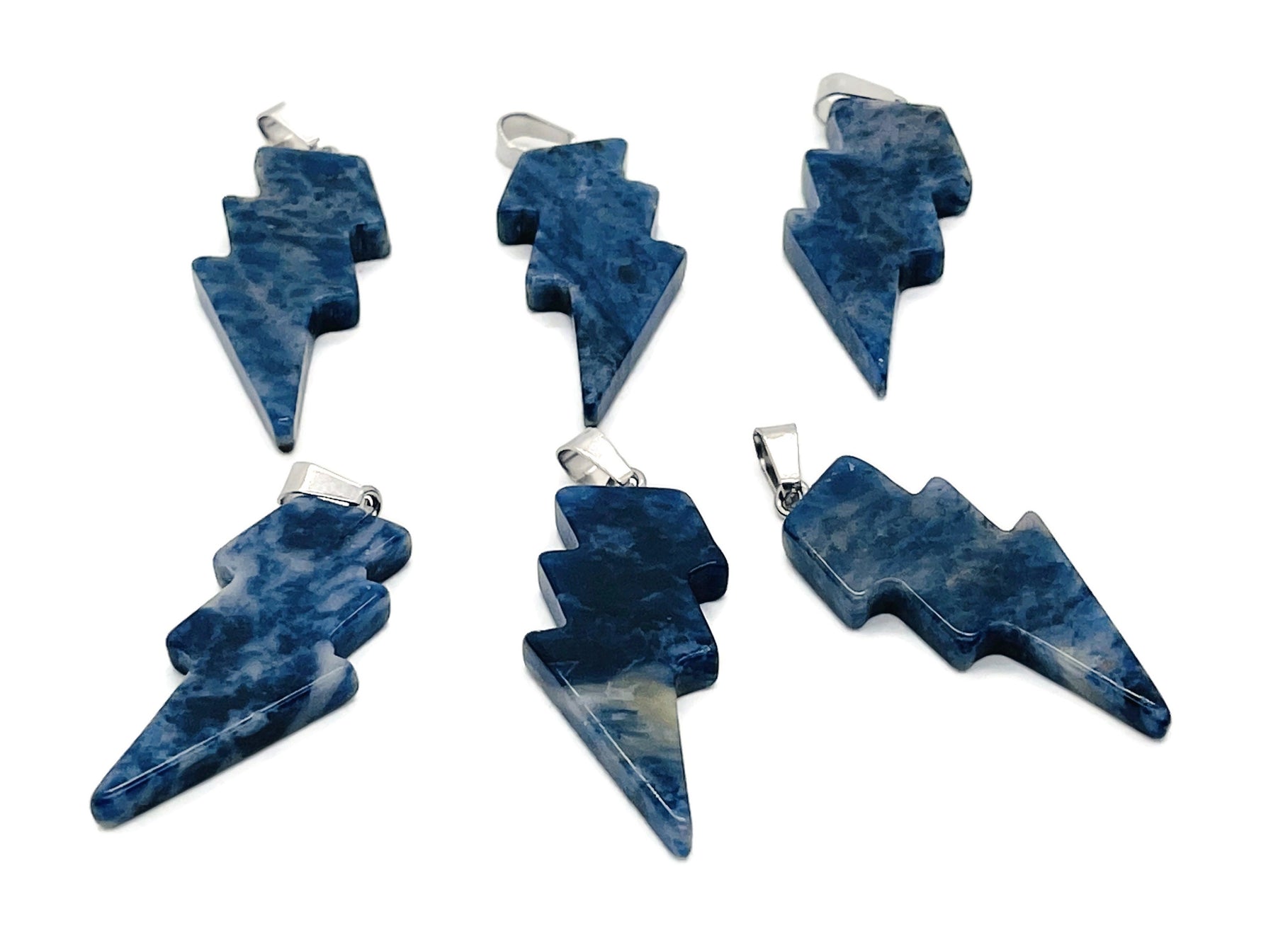 Sodalite Lightning Crystal Pendant by GemstoneGO featuring a vibrant lightning stone gemstone on a silver chain.