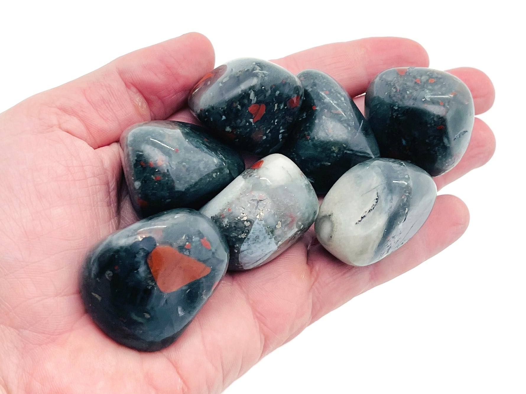 African Bloodstone tumbled gemstone from GemstoneGO, showing its deep green color with red bloodstone inclusions and smooth polished surface.