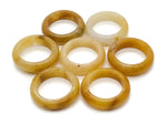 Yellow aventurine crystal ring by GemstoneGO featuring a polished yellow gemstone set in a silver band.