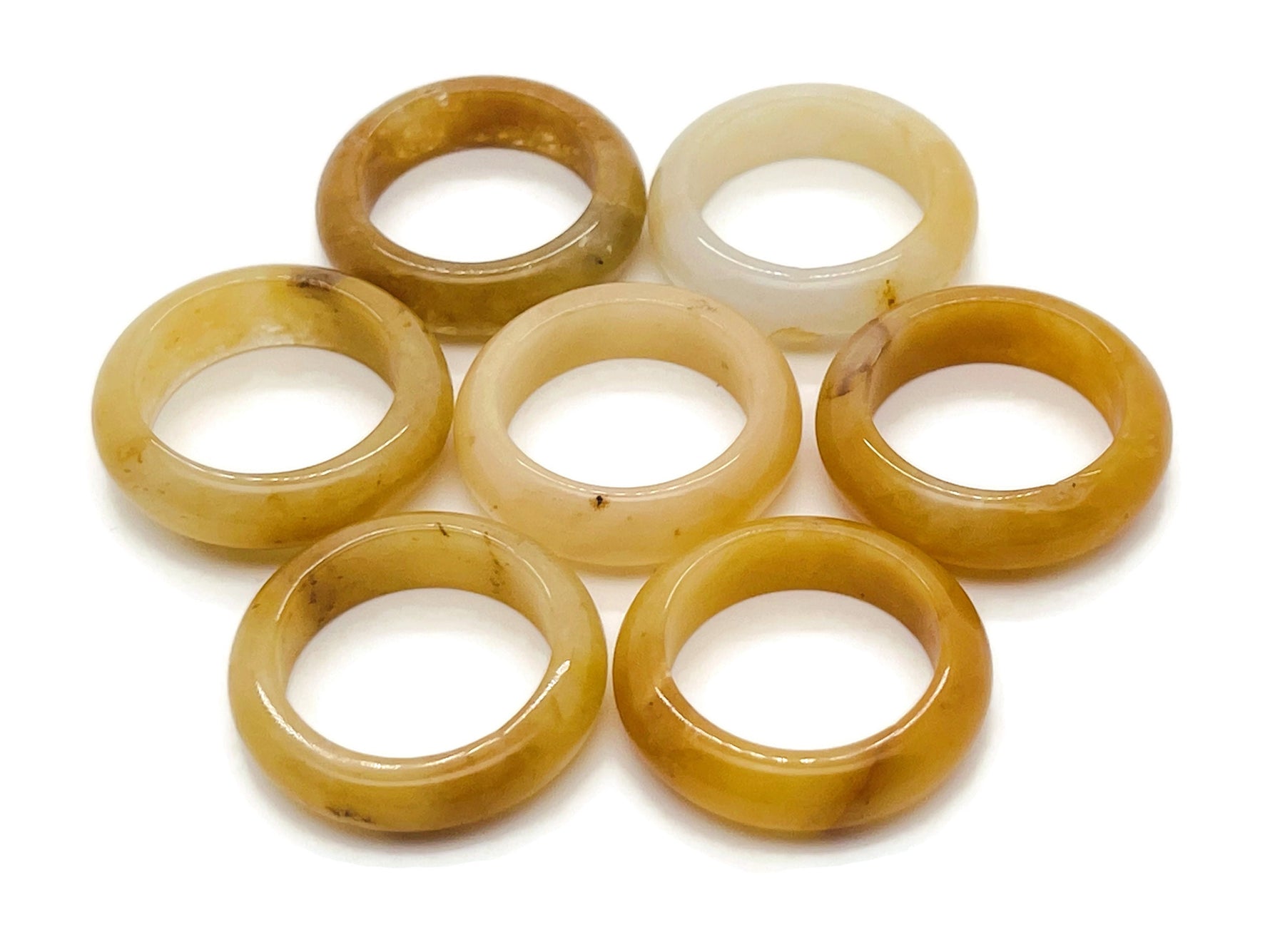 Yellow aventurine crystal ring by GemstoneGO featuring a polished yellow gemstone set in a silver band.