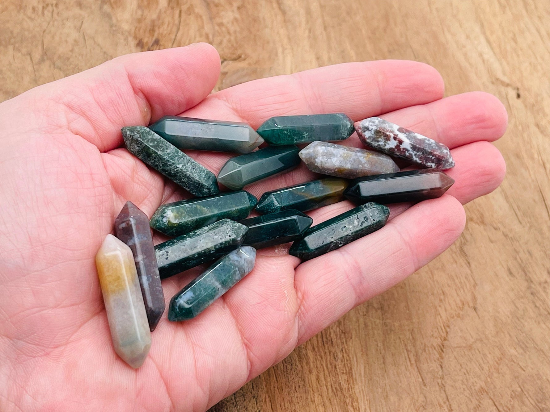 Moss agate terminated carved point gemstone, 33mm, with intricate natural green and brown patterns, from GemstoneGO.