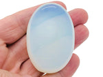 Opalite palm gemstone spa stone, 60x40mm, smooth polished gemstone with glowing, milky white appearance, perfect for relaxation and meditation.