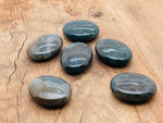 Moss Agate palm gemstone spa stone, 45x35mm, from GemstoneGO, showing green moss-like patterns on polished stone surface.