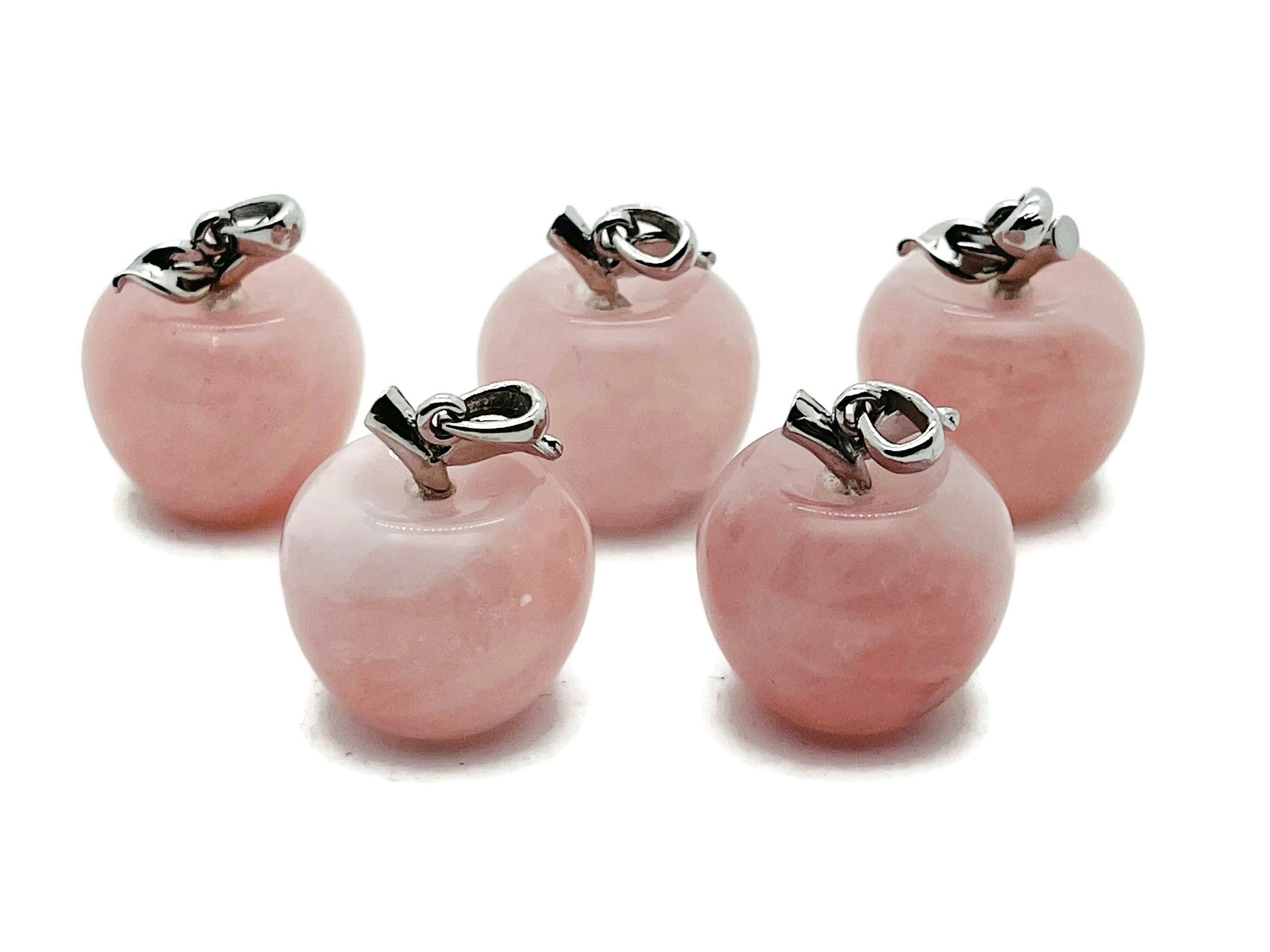 Mini rose quartz apple crystal pendant by GemstoneGO featuring a polished pink quartz apple-shaped charm on a silver chain