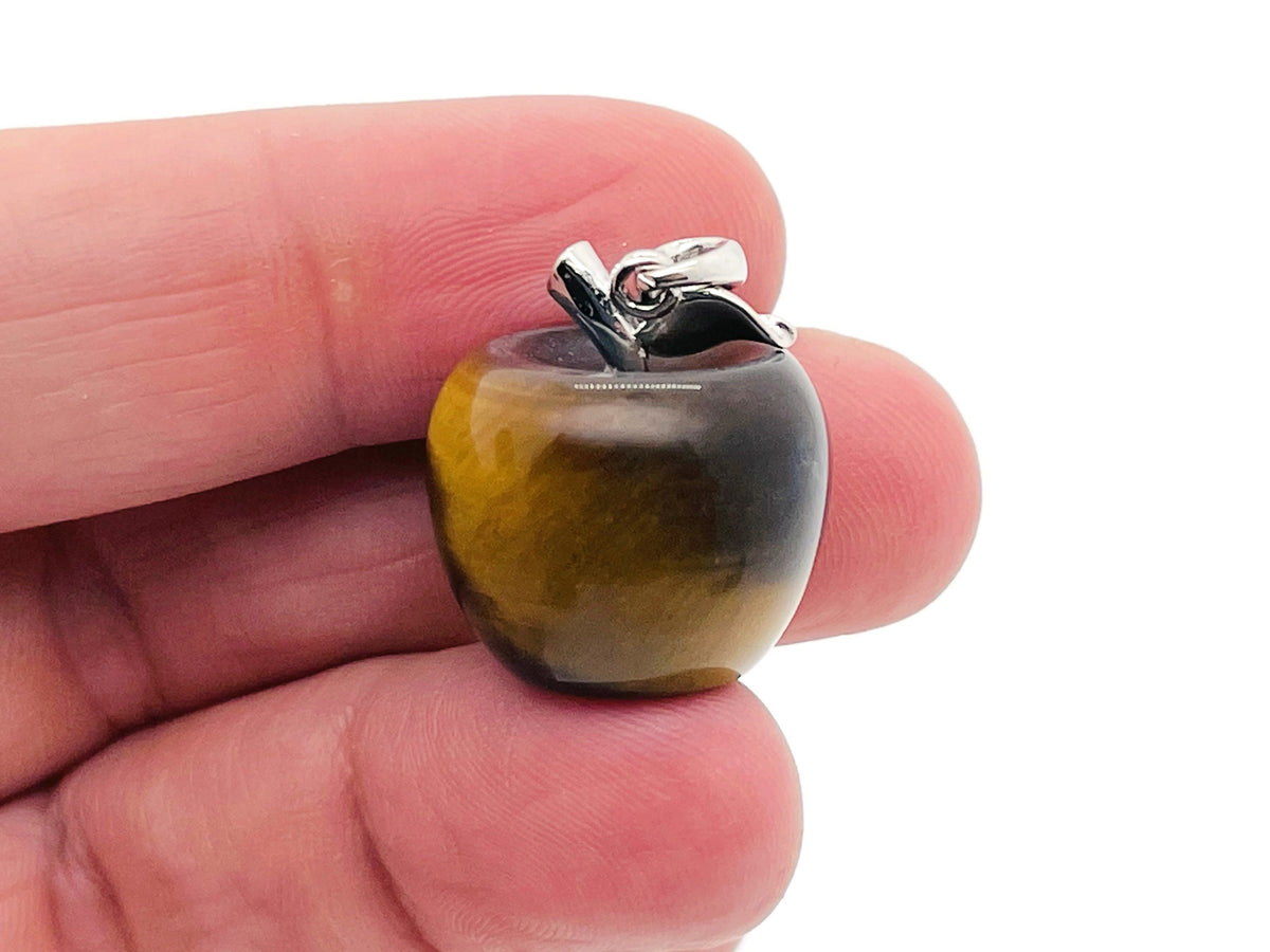 Tiger Eye apple-shaped crystal pendant from GemstoneGO featuring a mini gemstone pendant with a polished tiger eye stone.