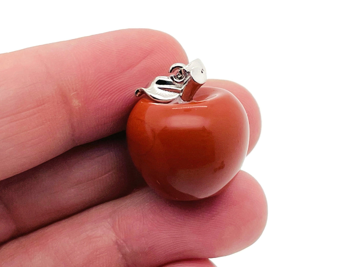 Red Jasper apple-shaped crystal pendant from GemstoneGO, featuring a mini crystal pendant with a polished red jasper finish.