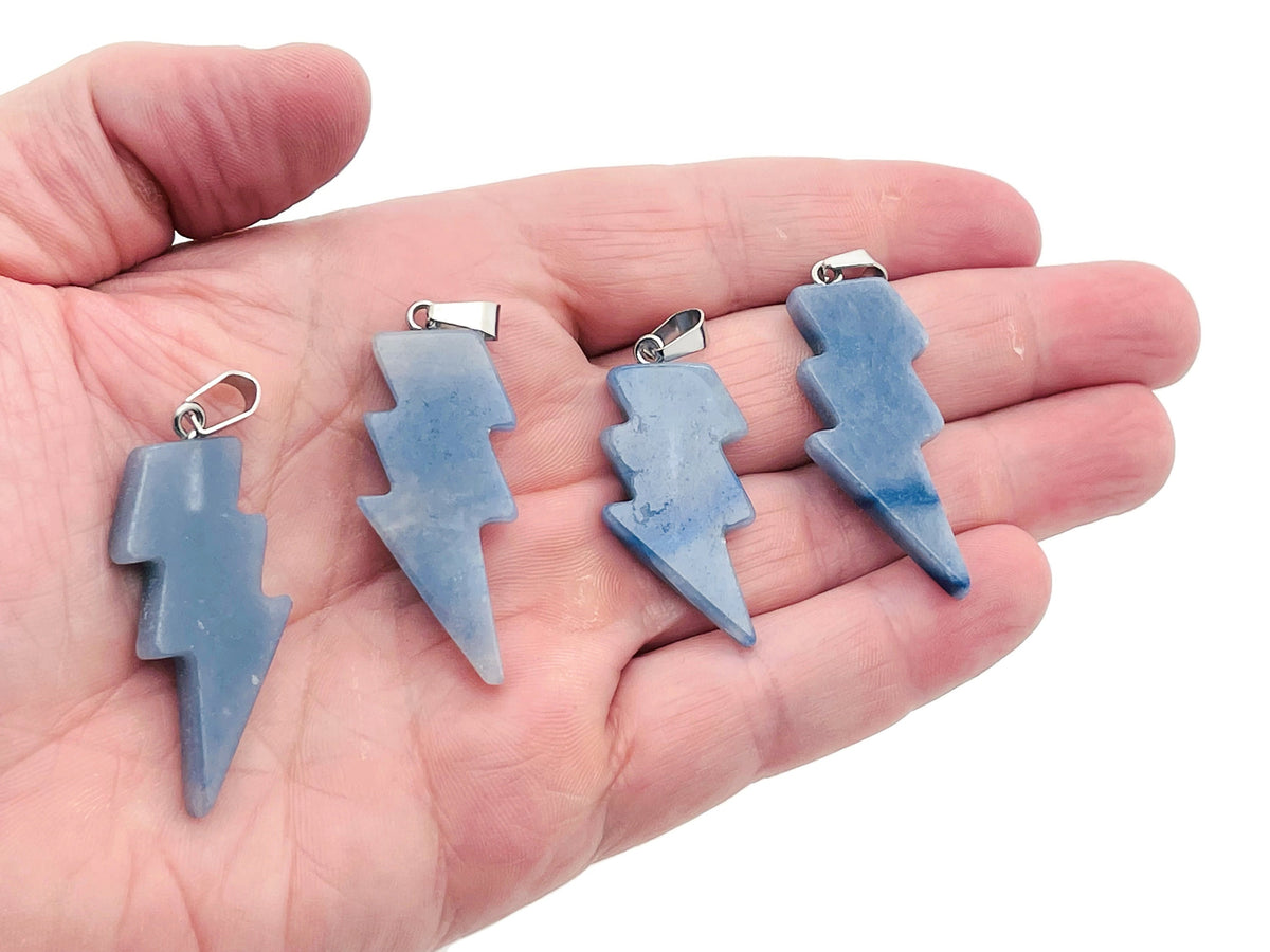 Blue aventurine lightning crystal pendant from GemstoneGO featuring a striking lightning stone design against a neutral background.
