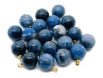 Sodalite ball beads crystal pendant from GemstoneGO, showcasing polished blue and white stone jewelry with silver accents.