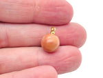 Orange aventurine ball beads crystal pendant featuring a polished gemstone, ideal for jewelry making and accessories.