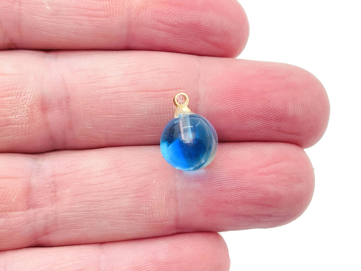 Angel Aura Ball Beads crystal pendant from GemstoneGO, featuring shimmering iridescent gemstone jewelry stone.