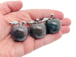 Moss agate apple-shaped crystal carving, 30mm, from GemstoneGO, showcasing detailed green and brown natural stone patterns.