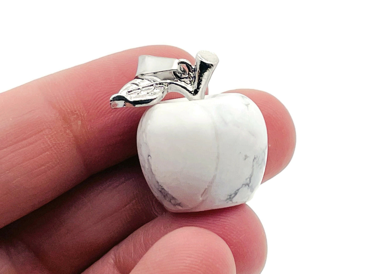 Mini Howlite Apple crystal pendant by GemstoneGO featuring a polished white gemstone in an apple shape.
