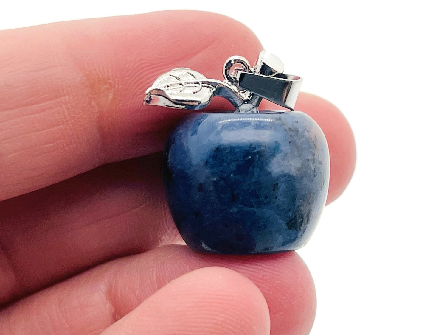 Mini Sodalite Apple crystal pendant by GemstoneGO featuring a deep blue gemstone with natural veining, perfect for jewelry.