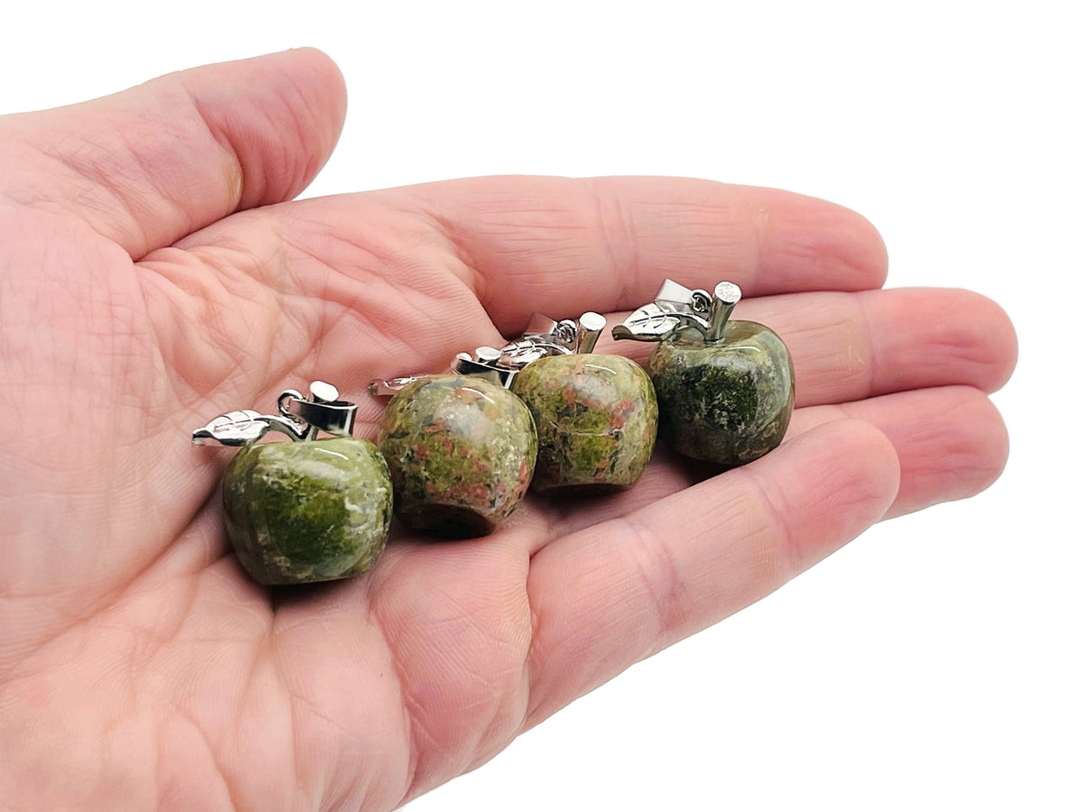 Unakite apple-shaped crystal pendant from GemstoneGO, small and polished gemstone jewelry with a silver bail.