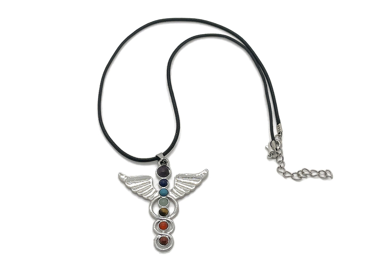 Angel wing crystal necklace with seven stones from GemstoneGO, featuring a delicate angel wing pendant and sparkling gemstones.