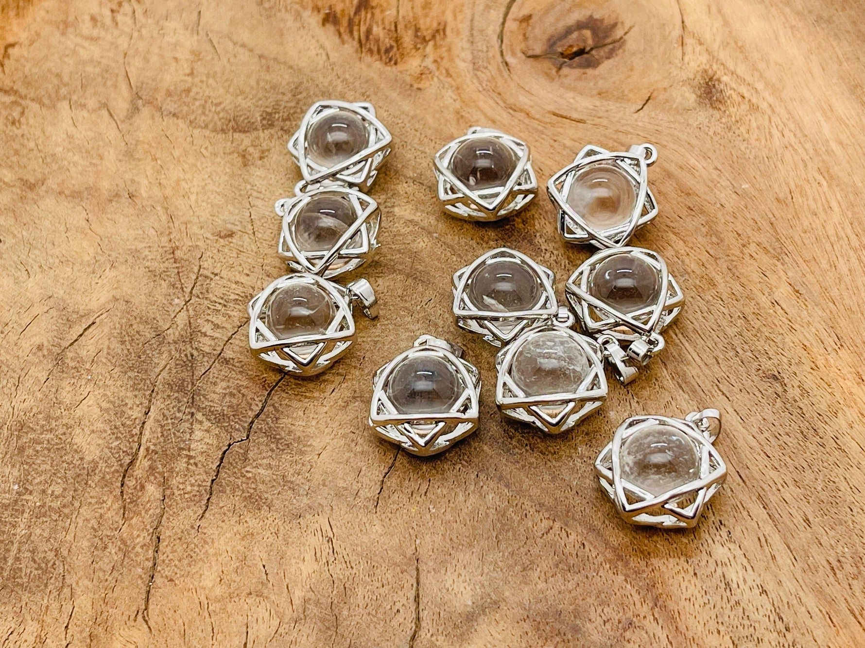 Clear quartz crystals pendant from GemstoneGO, featuring a polished natural gemstone on a delicate jewelry chain.