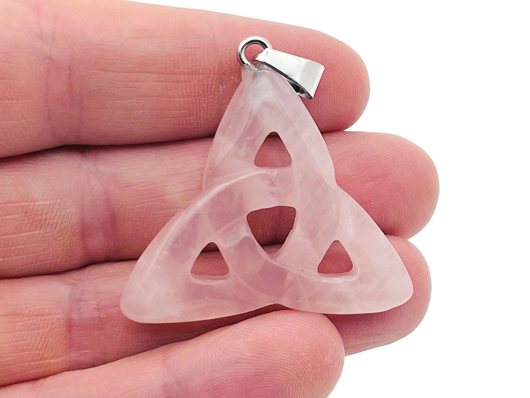 Rose Quartz Celtic Knot Crystal Pendant from GemstoneGO featuring a detailed Trinity Crystals design on a silver chain.