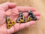 Tiger Eye Celtic Knot crystal pendant with Trinity Crystals by GemstoneGO, featuring intricate Celtic knot design and polished gemstone.