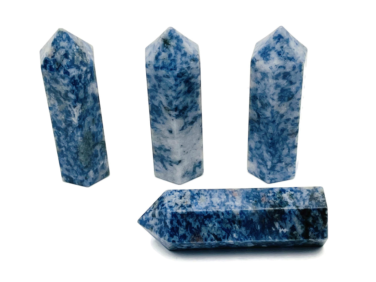 Blue Spot Jasper obelisk tower crystal from GemstoneGO, showcasing a tall, polished blue and earthy brown gemstone sculpture.