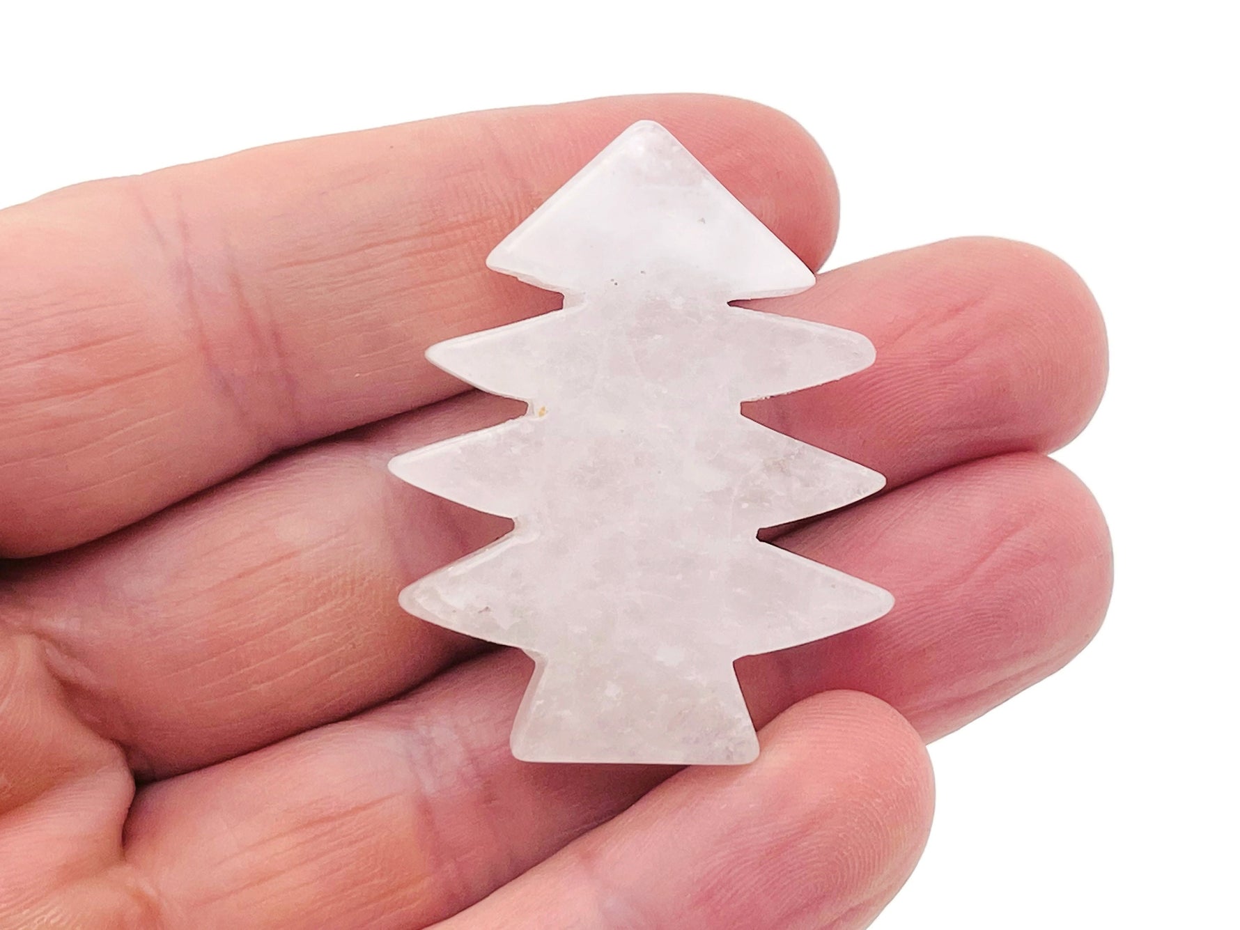 Handmade clear quartz pine tree carving gemstone, detailed tree sculpture on a smooth stone from GemstoneGO.