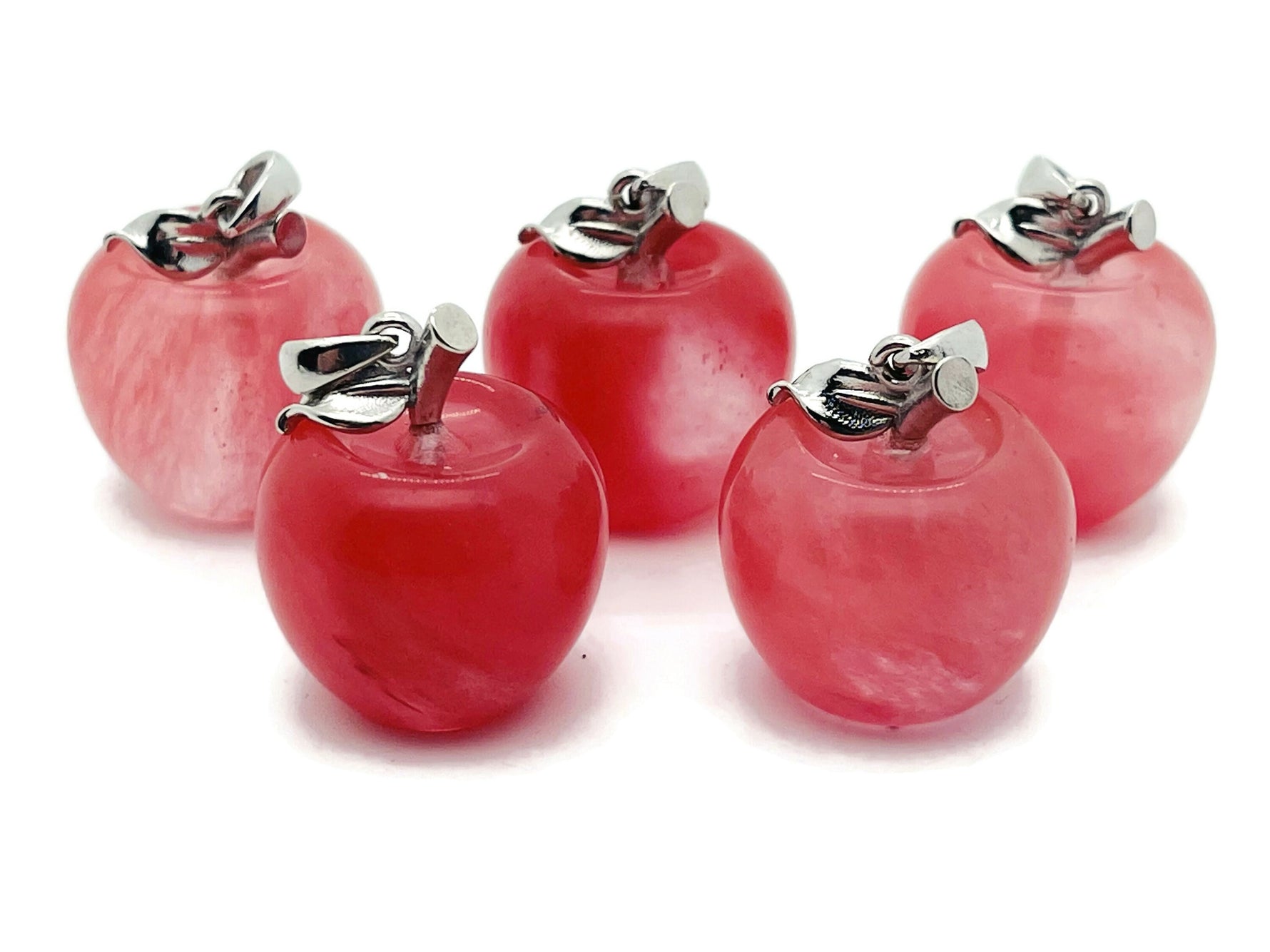 Cherry Quartz Apple Crystal Pendant by GemstoneGO featuring a mini cherry quartz crystal carved into an apple shape.