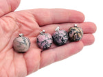 Rhodonite apple-shaped crystal pendant by GemstoneGO featuring a polished mini gemstone with silver-tone bail.